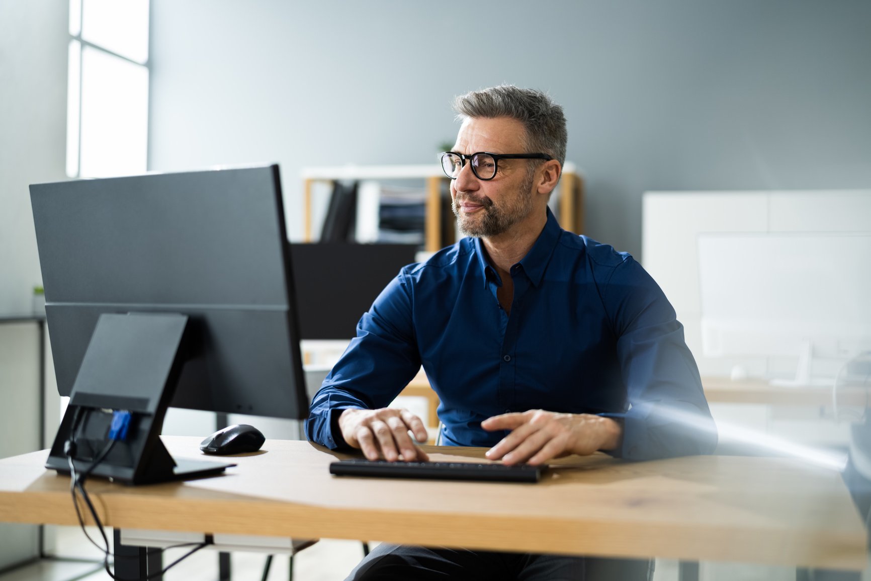 Man Using Computer in the Office